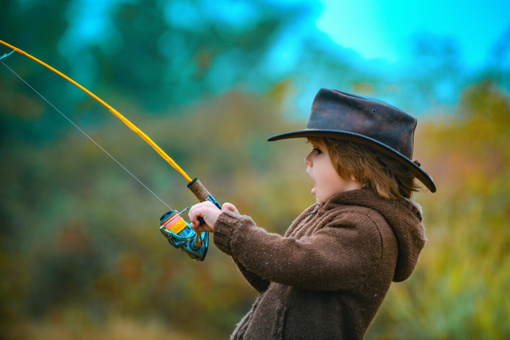 child catching his first fish