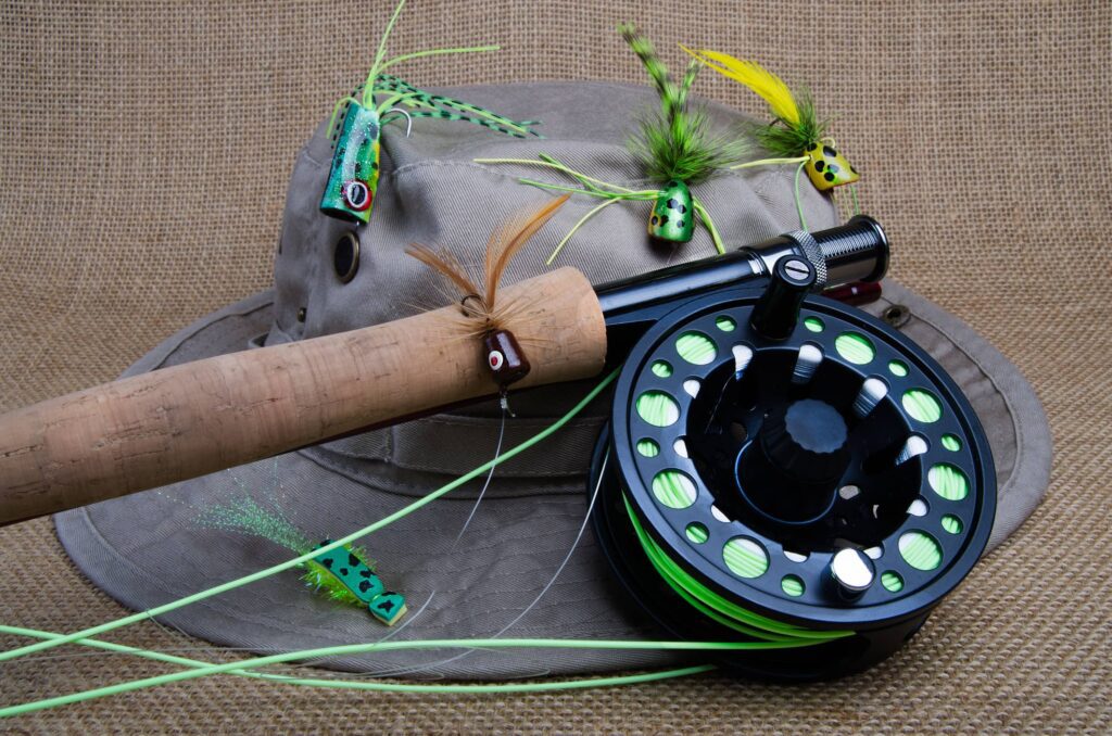 fly rod and fishing hat
